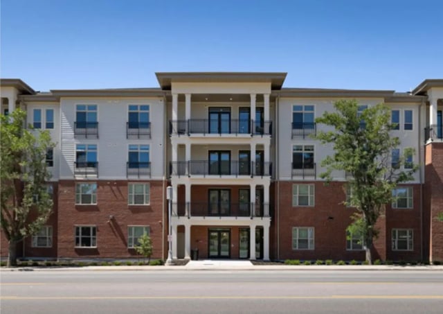 Modern apartment building with balconies and brick exterior exterior at Ivory University House in Salt Lake City Student Accommodation