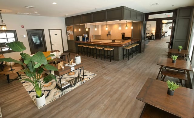 Bar stools at counter with kitchen area lounge at The Verge at Grand Forks in Grand Forks Student Accommodation