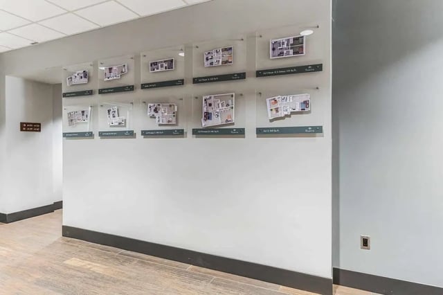 Floor plans displayed on wall hallway display at 12 North in College Station Student Accommodation