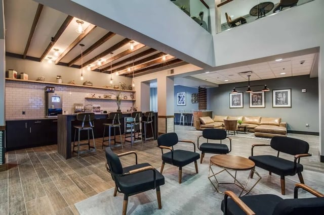 Bar lounge area with seating and couches living room at 12 North in College Station Student Accommodation