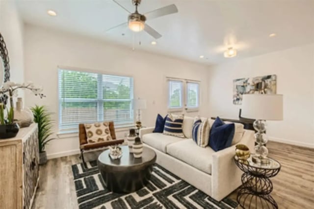 Sofa chair coffee table artwork Living Room at BelCara Luxury Townhomes in San Antonio Student Accommodation