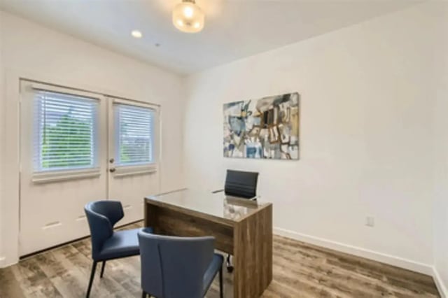 Desk chairs artwork modern office space at BelCara Luxury Townhomes in San Antonio Student Accommodation
