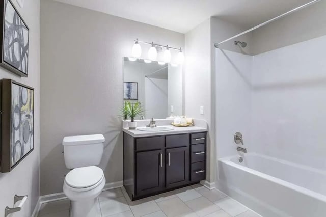 Toilet vanity sink bathtub shower bathroom at Bridge at Cameron in Austin Student Accommodation
