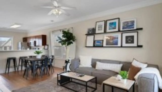 Sofa coffee table dining set kitchen living room at The Cottages at Lake Tamaha in Tuscaloosa Student Accommodation