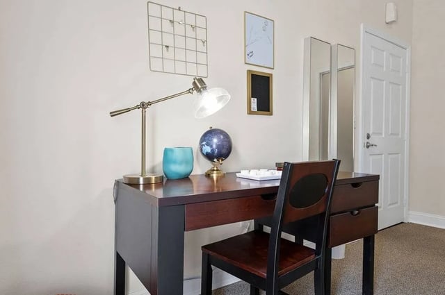 Desk lamp globe chair on desk Study area at Central House on Stadium in Mobile Student Accommodation