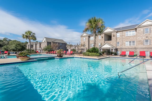 Resort style pool with lounge chairs exterior at Central House on Stadium in Mobile Student Accommodation