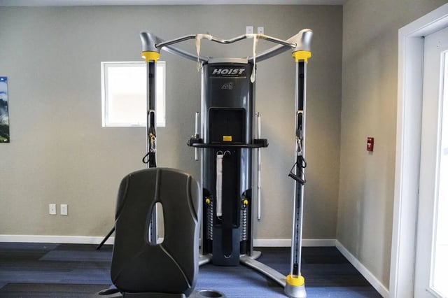 Cable machine and seat gym area at Uptown Broadway in Boulder Student Accommodation