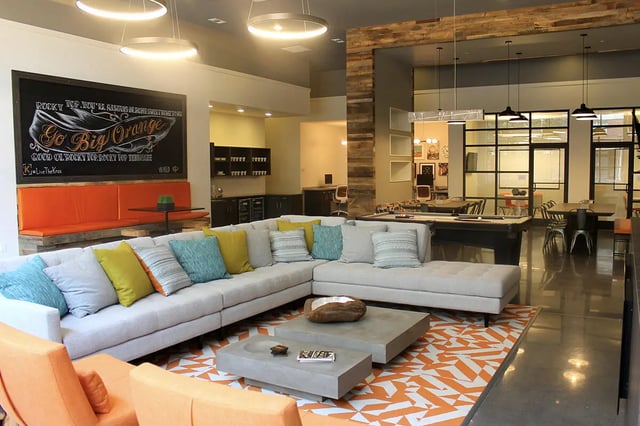 Sectional sofa coffee tables pool table living room at The Knox in Knoxville Student Accommodation