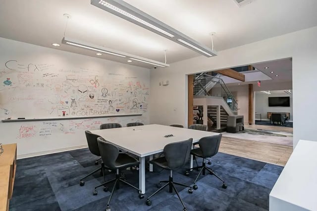 Whiteboard with drawings table and chairs Meeting room at Copper Social in Marietta Student Accommodation