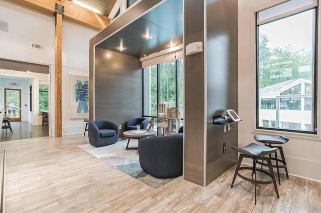 Modern seating area with chairs and stools communal area at Copper Social in Marietta Student Accommodation