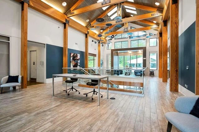 Open common area with desks and seating Living area at Copper Social in Marietta Student Accommodation