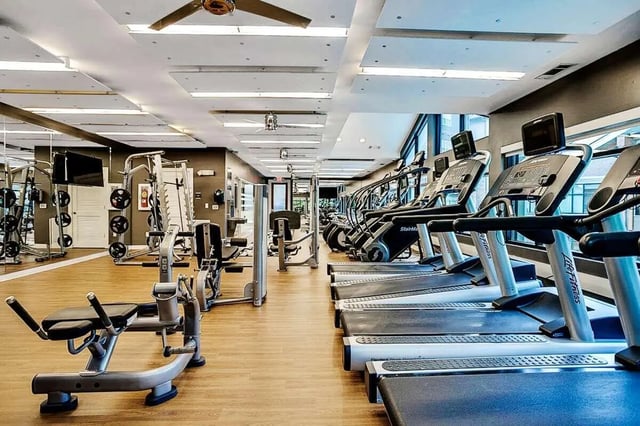 Treadmills weight machines gym equipment playing area at Copper Social in Marietta Student Accommodation