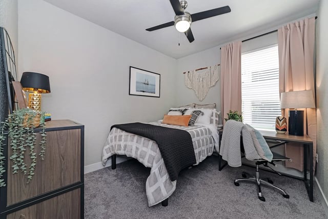 Bed desk and dresser bedroom at Alsander GNV in Gainesville Student Accommodation