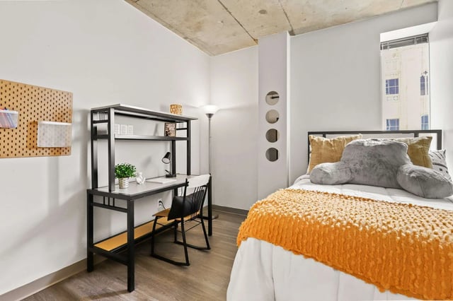 Desk pegboard bed and window bedroom at Auraria Student Loft in Denver Student Accommodation
