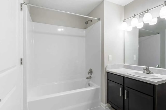 White bathtub and dark vanity Bathroom at Goodnight Commons in Austin Student Accommodation