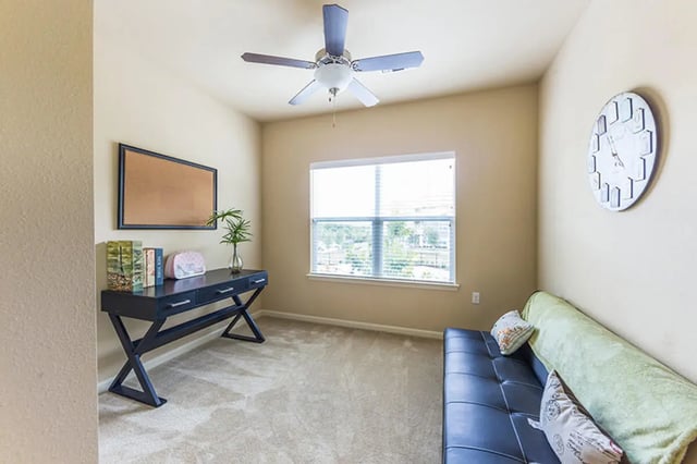 Desk sofa and corkboard study area at Harris Branch Senior in Austin Student Accommodation