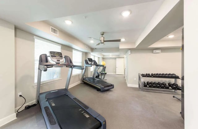 Treadmills and dumbbell rack fitness room at Harris Branch Senior in Austin Student Accommodation
