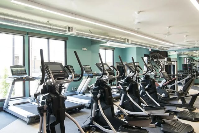 Treadmills elliptical machines and weight racks gym at Gateway on Cullen in Houston Student Accommodation
