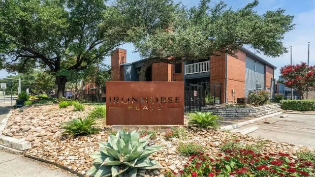 Sign with Iron Horse Flats name exterior at Ironhorse Flats in Austin Student Accommodation