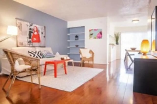 Living room with sofa chairs and table living room at Lightsey Place Apartments in Austin Student Accommodation