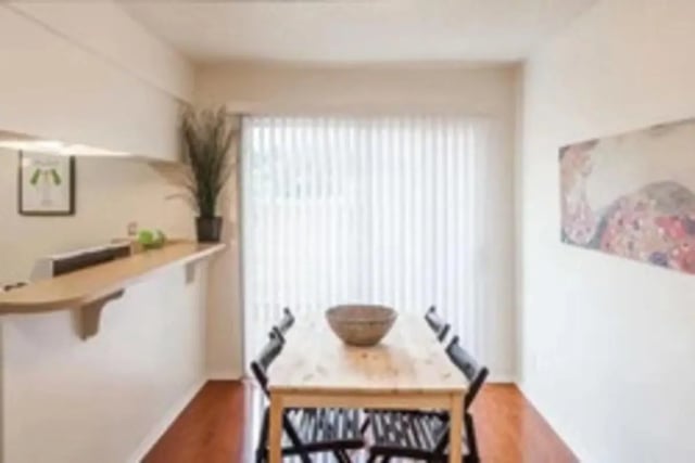 Dining table and chairs kitchen counter dining area at Lightsey Place Apartments in Austin Student Accommodation