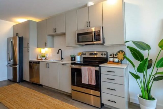 Stainless steel appliances sink cabinets kitchen at Rambler Austin in Austin Student Accommodation