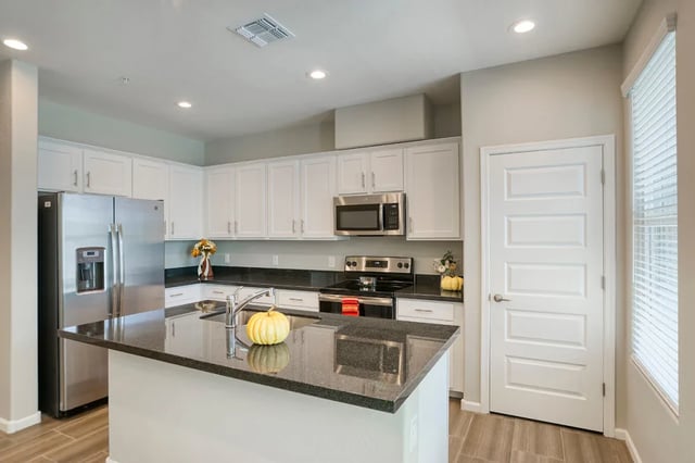 Stainless steel refrigerator island counter kitchen at BB Living at Val Vista in Gilbert Student Accommodation