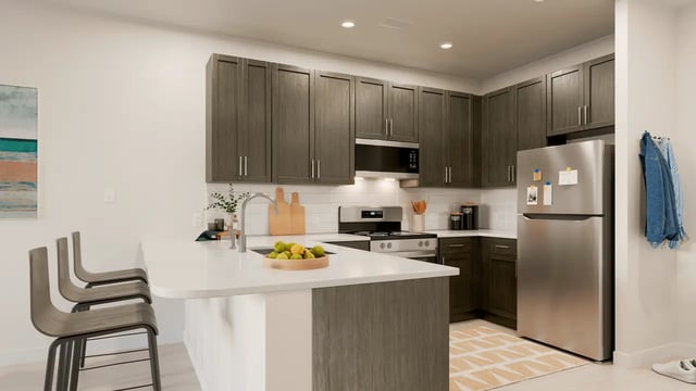 Modern kitchen with island refrigerator appliances kitchen at Ten60 Halifax in Daytona Beach Student Accommodation