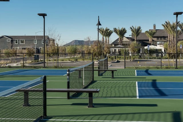 Tennis courts with benches and nets outdoor playing area at BB Living at Union Park in Phoenix Student Accommodation