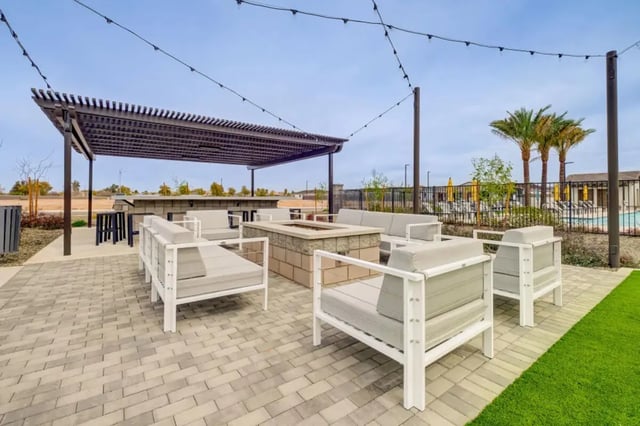 Outdoor seating fire pit pergola bar area exterior at BB Living at Civic Square in Goodyear Student Accommodation