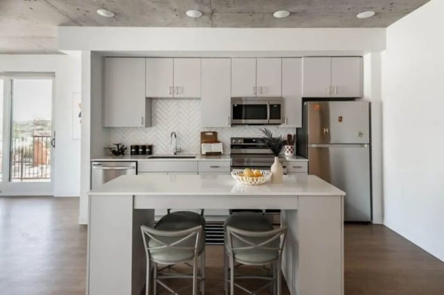 Modern kitchen with island and bar stools kitchen at Ari on Fourth in Tucson Student Accommodation