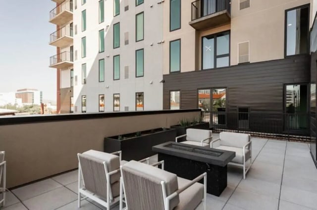 Chairs and fire pit on patio exterior at Ari on Fourth in Tucson Student Accommodation