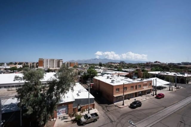 Buildings with trees and cars exterior at Ari on Fourth in Tucson Student Accommodation