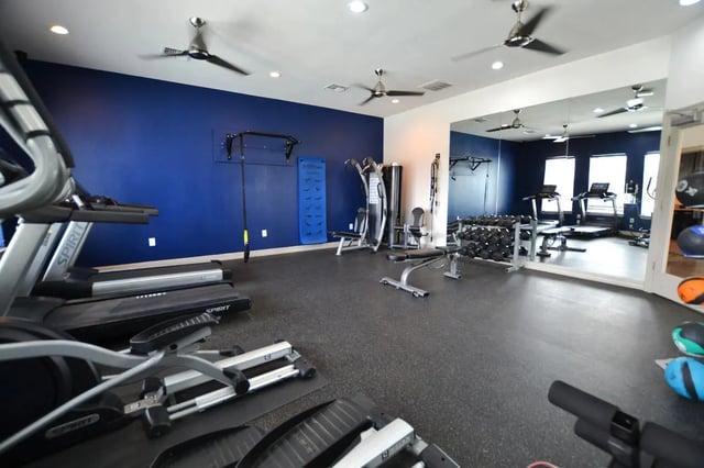 Treadmills elliptical cross trainer and weights gym at Riverside Villas in Fort Worth Student Accommodation