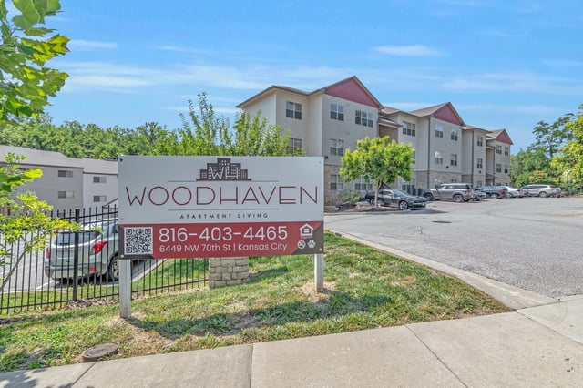 Woodhaven Apartment Living sign exterior at Woodhaven Apartment Living in Kansas City Student Accommodation