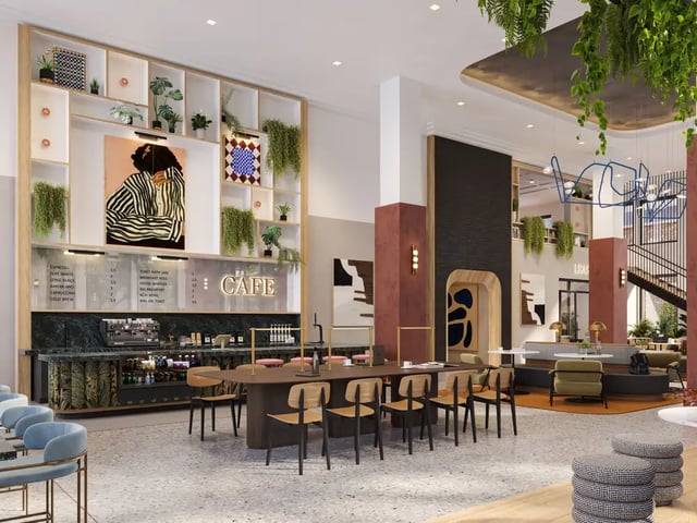 Cafe with art work and seating area living room at VERVE Ann Arbor in Ann Arbor Student Accommodation