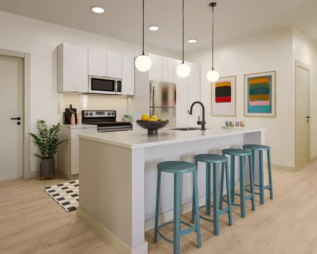 Modern kitchen island with stools and artwork Kitchen at VERVE Ann Arbor in Ann Arbor Student Accommodation