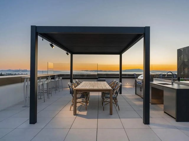 Dining table grill kitchen outdoor living space at Ace Berkeley in Berkeley Student Accommodation