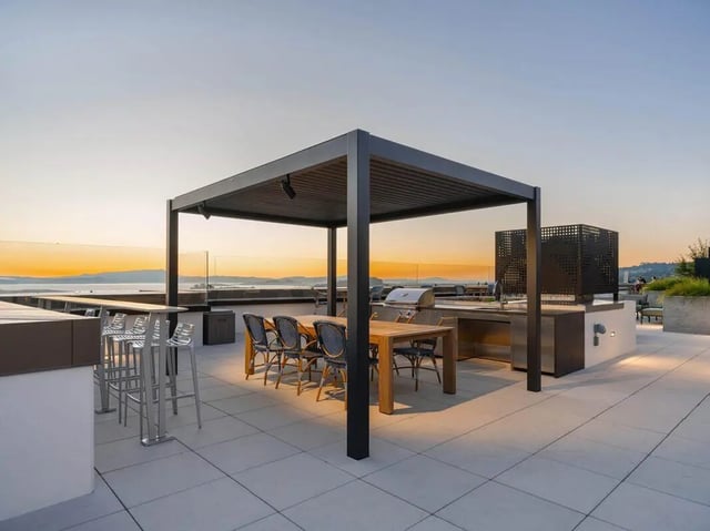 Rooftop dining area with barbecue and seating patio at Ace Berkeley in Berkeley Student Accommodation