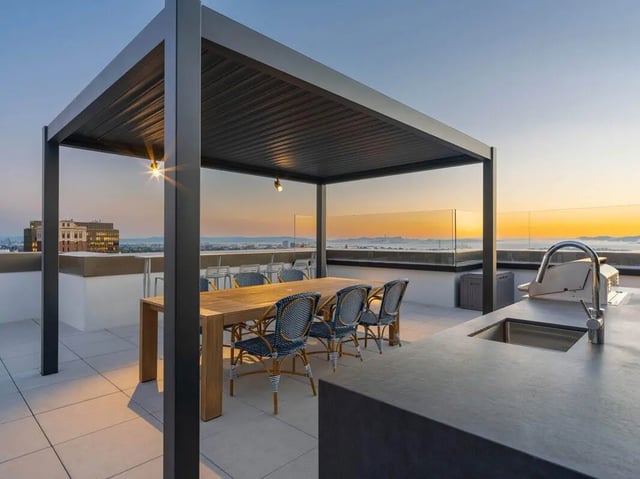 Pergola outdoor dining table chairs sink grill patio at Ace Berkeley in Berkeley Student Accommodation