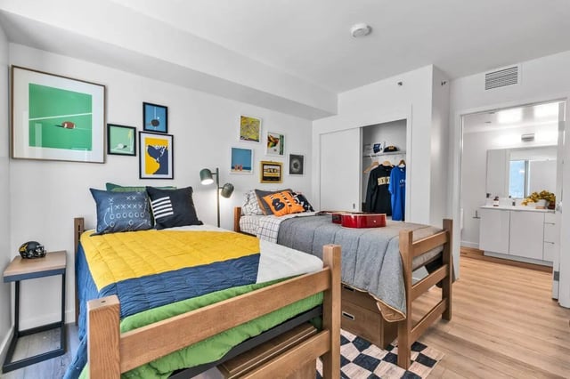 Two beds art wall closet and bathroom Bedroom at Ace Berkeley in Berkeley Student Accommodation