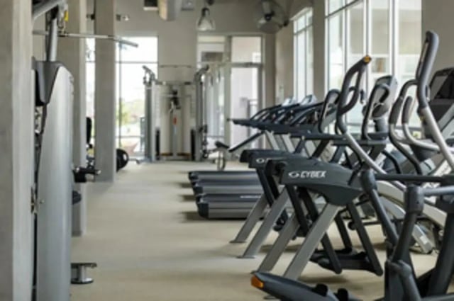 Gym equipment including treadmills and ellipticals gym at The Flats at Big Tex in San Antonio Student Accommodation