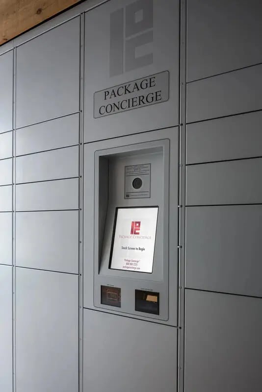 Package concierge lockers with touch screen exterior at The Flats at Big Tex in San Antonio Student Accommodation