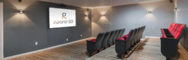 Auditorium style seating with screen playing area at The Grand 1501 in College Station Student Accommodation