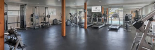 Gym equipment treadmills weights and machines fitness center at The Grand 1501 in College Station Student Accommodation