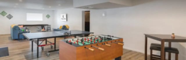 Foosball and ping pong tables with seating Living room at The Grand 1501 in College Station Student Accommodation