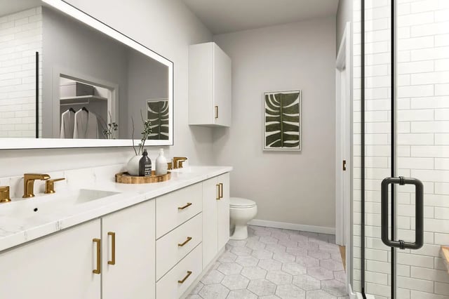 Double vanity with gold fixtures and shower Bathroom at The Mercury in Austin Student Accommodation