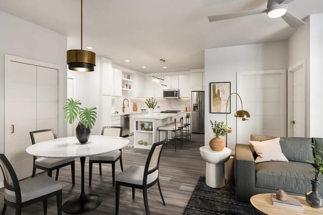 Dining table chairs kitchen island living room living area at The Mercury in Austin Student Accommodation