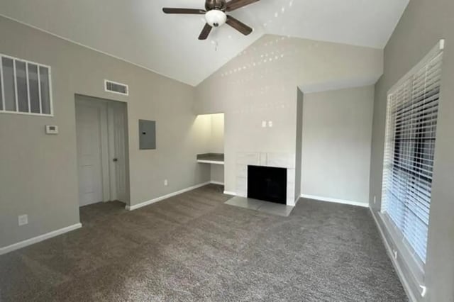Fireplace built-in desk ceiling fan living room at Villas at Alameda in Fort Worth Student Accommodation