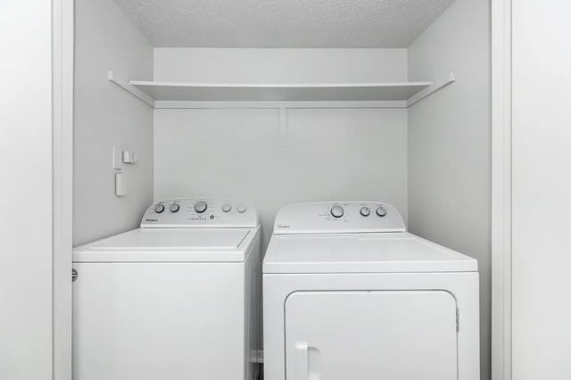 Washer dryer and shelf Laundry area at Villas at Shadow Oaks in Austin Student Accommodation